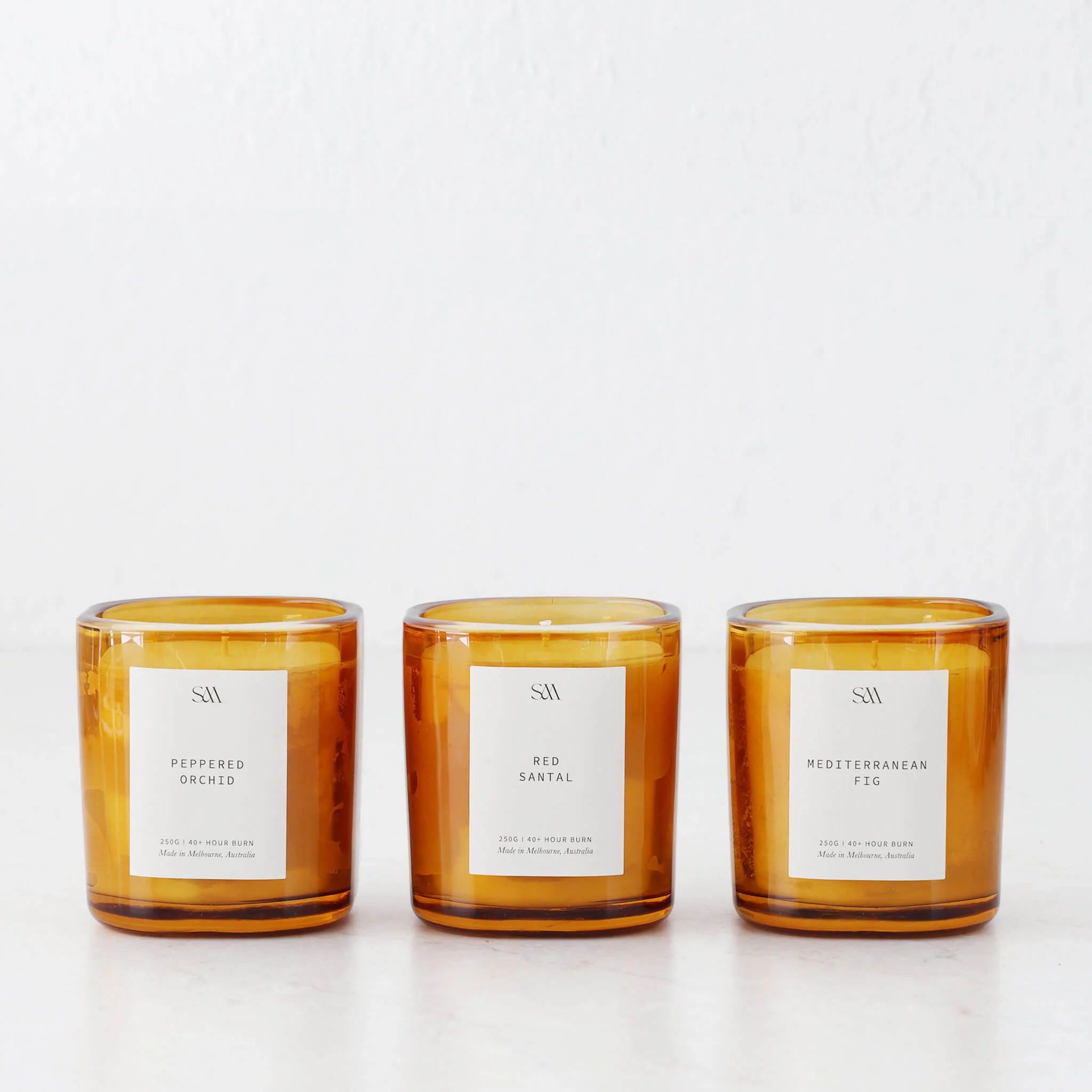 STUDIO MCKENNA | SIGNATURE BOX SET OF 3 CANDLES | MEDITERRANEAN FIG + RED SANTAL + PEPPERED ORCHID - Image 8